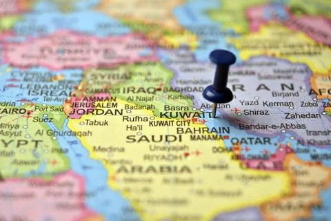Blue Push Pin Marking Kuwait on Paper World Map Macro Close Up with Blurred.. Stock Photos