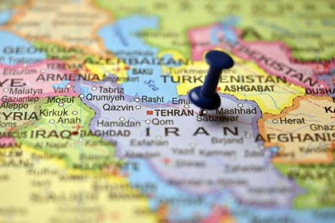 Blue Push Pin Marking Tehran on Blurred World Map Macro Close Up Travel Bac.. 스톡 사진