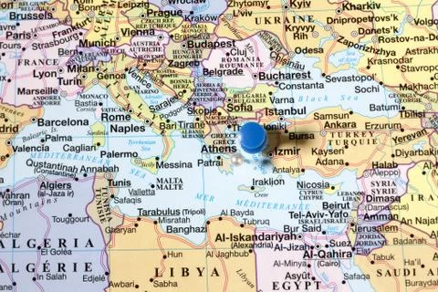 Blue push pins on world map Stock Photos