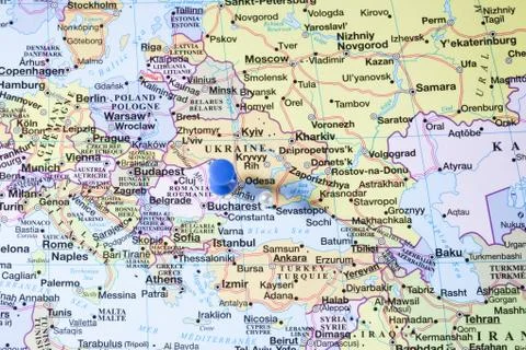 Blue pushpin on a map Stock Photos