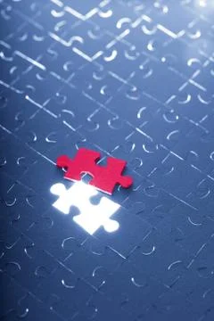 Blue puzzle with one red piece Stock Photos