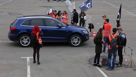 Blue racing suv car start on a drift race. A lot of people around. Stock Footage 107828754