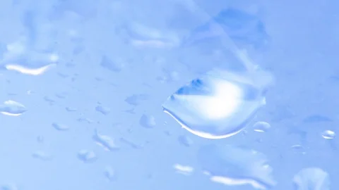 Blue rain drops Stock Footage 98545732