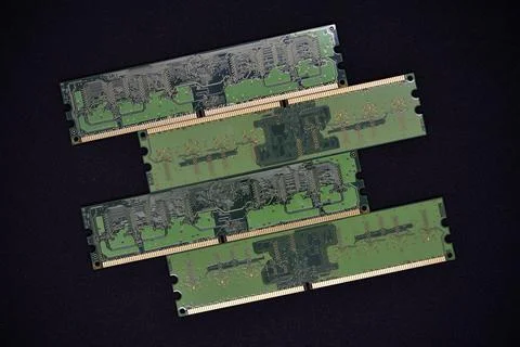 Blue RAM bars on a black background. Computer memory chips. Computer chips. Stock Photos