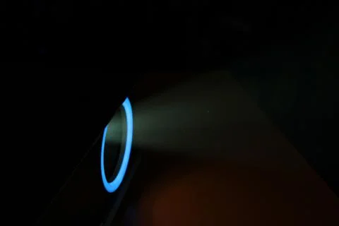 Blue rays of light through the smoke from the projector. Lighting equipment.  Stock Photos