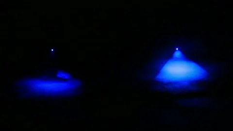 Blue rays of profile spotlights in the dark in a smoke blanket. Stock Footage 111072496