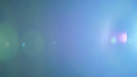 Blue real lens flare background, Alpha Channel. Stock Footage