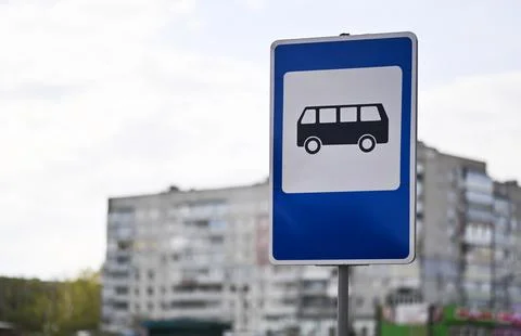Blue rectangular road sign shows public transit stop. Stock Photos
