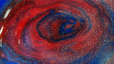 Blue-red background with luminous grains Video stock 235819100