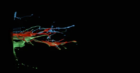 Blue, red &amp; green paint in motion in 4K Stock Footage 59921132