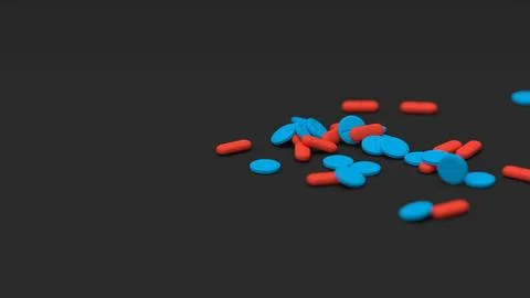 Blue red tablets on black background with shallow DOF. Drugs, pills, tablets Stock Illustration