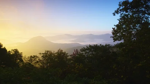 Blue Ridge mountains and clouds at sunrise  Stock Footage 103825986