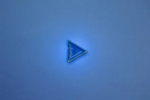 Blue right direction arrow on navy blue background Stock Photos