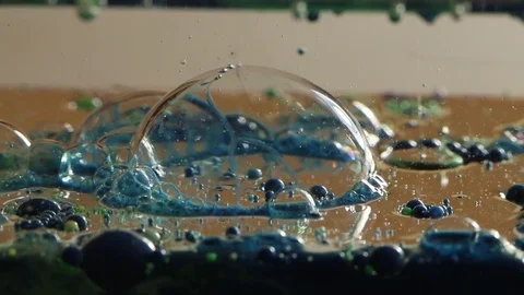 Blue-Rimmed Bubble Pops Stock Footage 75466681