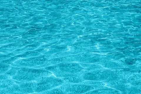Blue ripple water surface with reflection Stock Photos