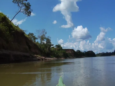 Blue River and Clouds From Boat On River in Amazon Jungle Rainforest Video stock 112946326