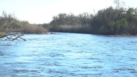Blue River Running, Sunny Spring Day, Water Rushing, 4K Stock Footage 105154344