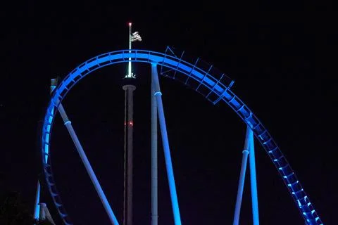Blue Roller Coaster Loop at Night Stock Photos