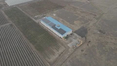 Blue-roofed warehouse in the field 9 库存影片 330803244