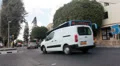 Blue route bus turning to the main bus station at the Paphos harbour. Cyprus HD Footage