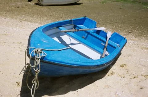 Blue rowboat Stock Photos