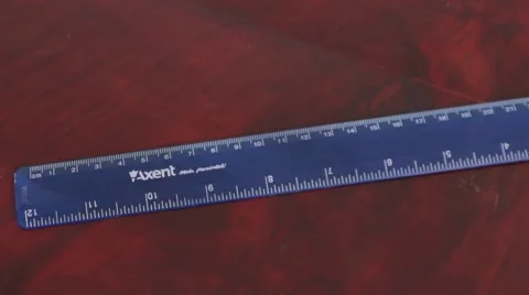 The blue ruler is on the table LR Pan &amp; RL Pan Stock Footage 53281417