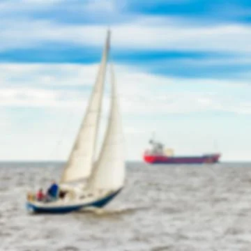 Blue sailboat - blurred image 스톡 사진