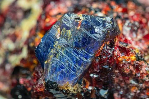 Blue sapphire on ruby matrix Photos