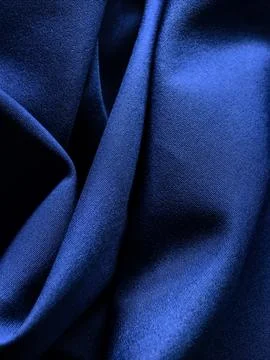 Blue Satin Fabric Texture With Deep Folds Stock Photos