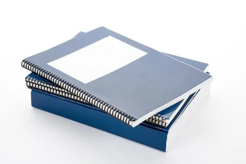 Blue school textbook, notebook or manual with white background Stock Photos