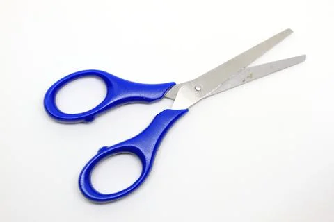 Blue scissors isolated on a white background Stock Photos