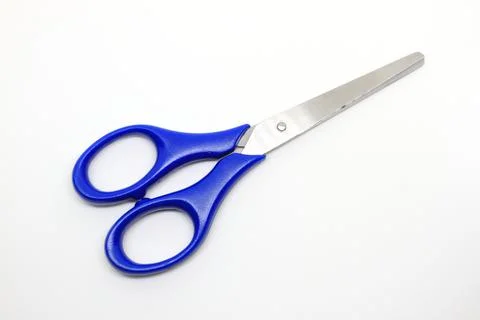 Blue scissors isolated on a white Stock Photos