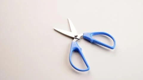 Blue Scissors on white background Stock-Fotos