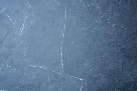 Blue scratched stone texture on background. Texture wallpaper Stock Photos