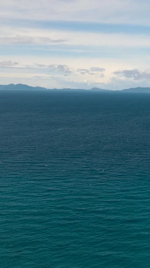 Blue sea and sky with clouds. Stock Footage 252253381