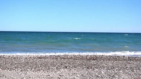 Blue sea beach with big waves, beautiful sunny day, HD Stock Footage 303058698
