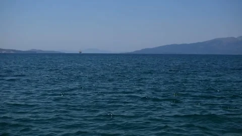Blue sea with reflections of waves Stock Footage 158080543