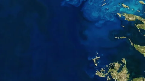 Blue sea satellite view, rotating spiral microorganism blossom around Falkland Video stock 143567592