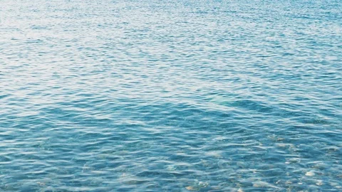 Blue sea surface close up pattern. Sea view on summer day. Beautiful summer 4k Stock Footage 112753228