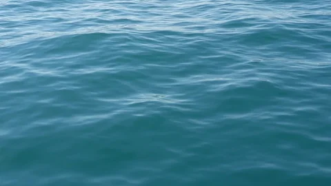 Blue sea surface close up. Soft sea waves on water surface. Blue deep water Stock Footage 95464291