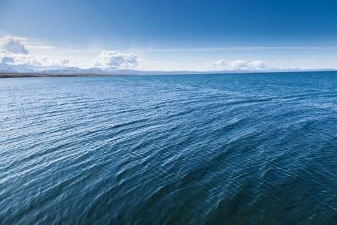 Blue sea surface with small waves Stock Photos