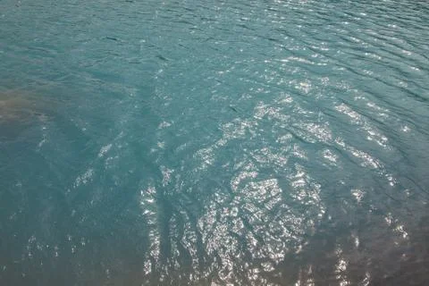 Blue sea surface with small waves Stock Photos