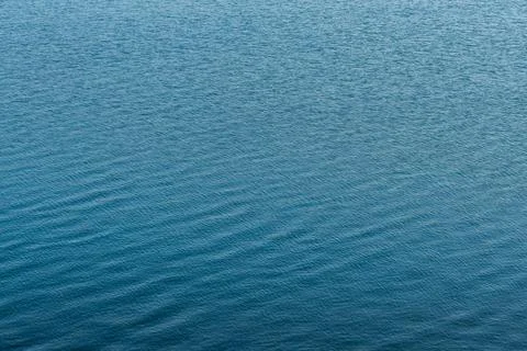 Blue sea surface with small waves. Texture Stock-Fotos