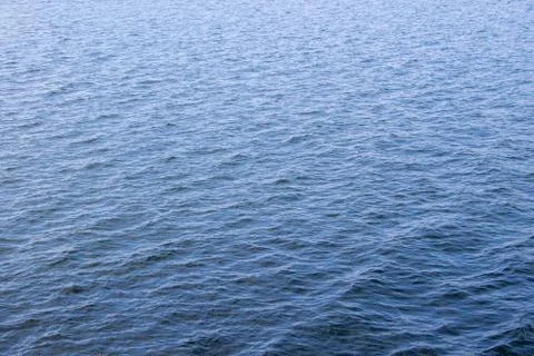 Blue sea surface with waves Stock Photos
