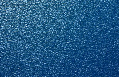 Blue sea surface with waves Stock Photos