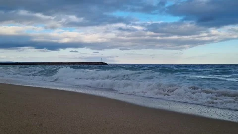 Blue Sea Waves and Cloudy Sky at Sunset Stock Footage 319817792