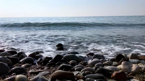 Blue sea, the waves beating against the shore Stock Footage 121331704