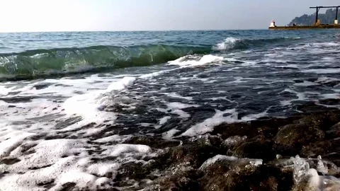 Blue sea, the waves beating against the shore Stock Footage 121331733