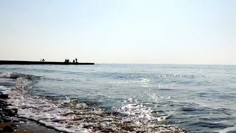 Blue sea, the waves beating against the shore Stock Footage 121331771