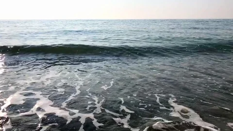 Blue sea, the waves beating against the shore Stock Footage 121331815